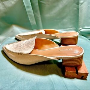 Express whites mules.